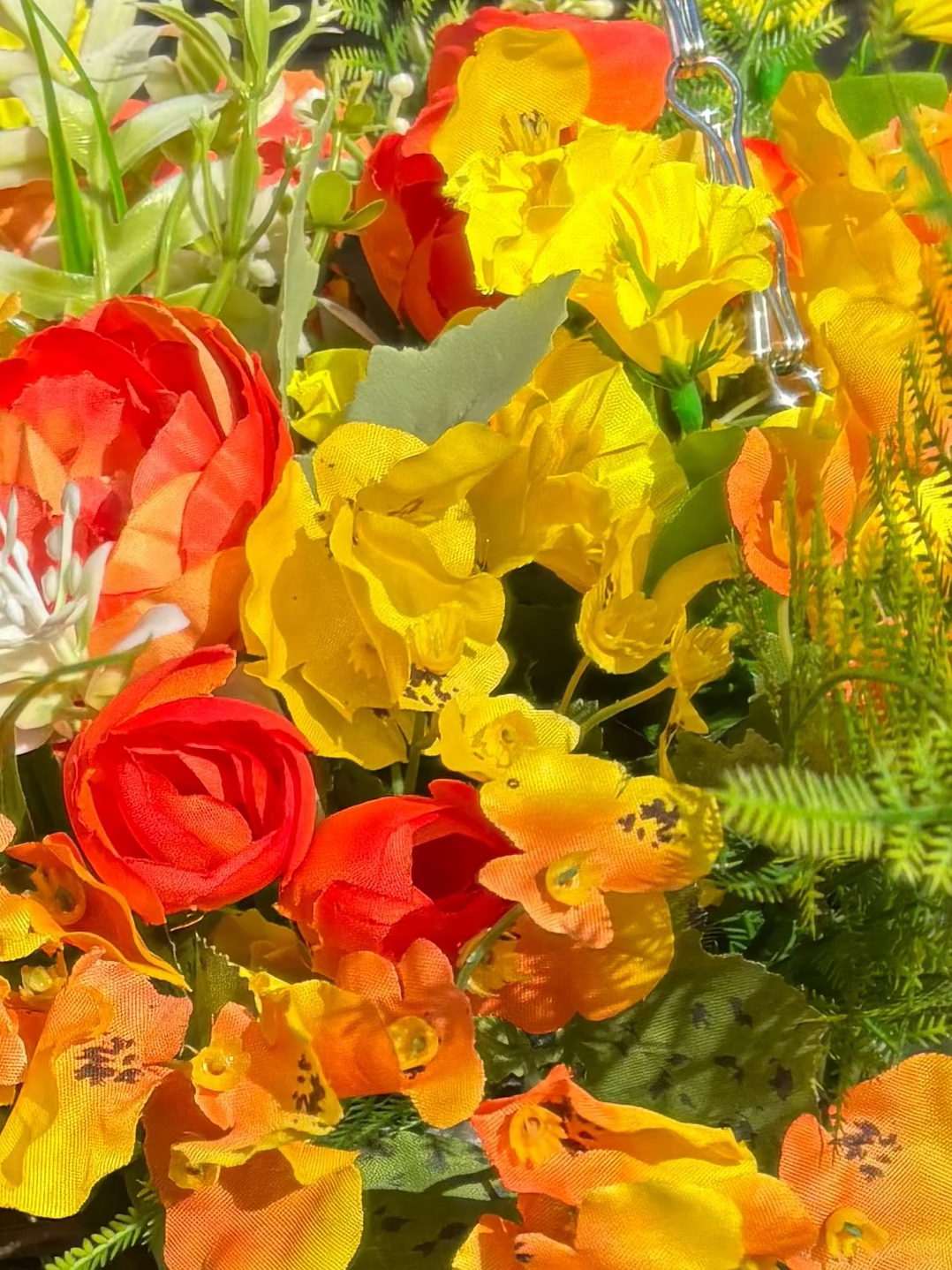 Orange and yellow fence pots