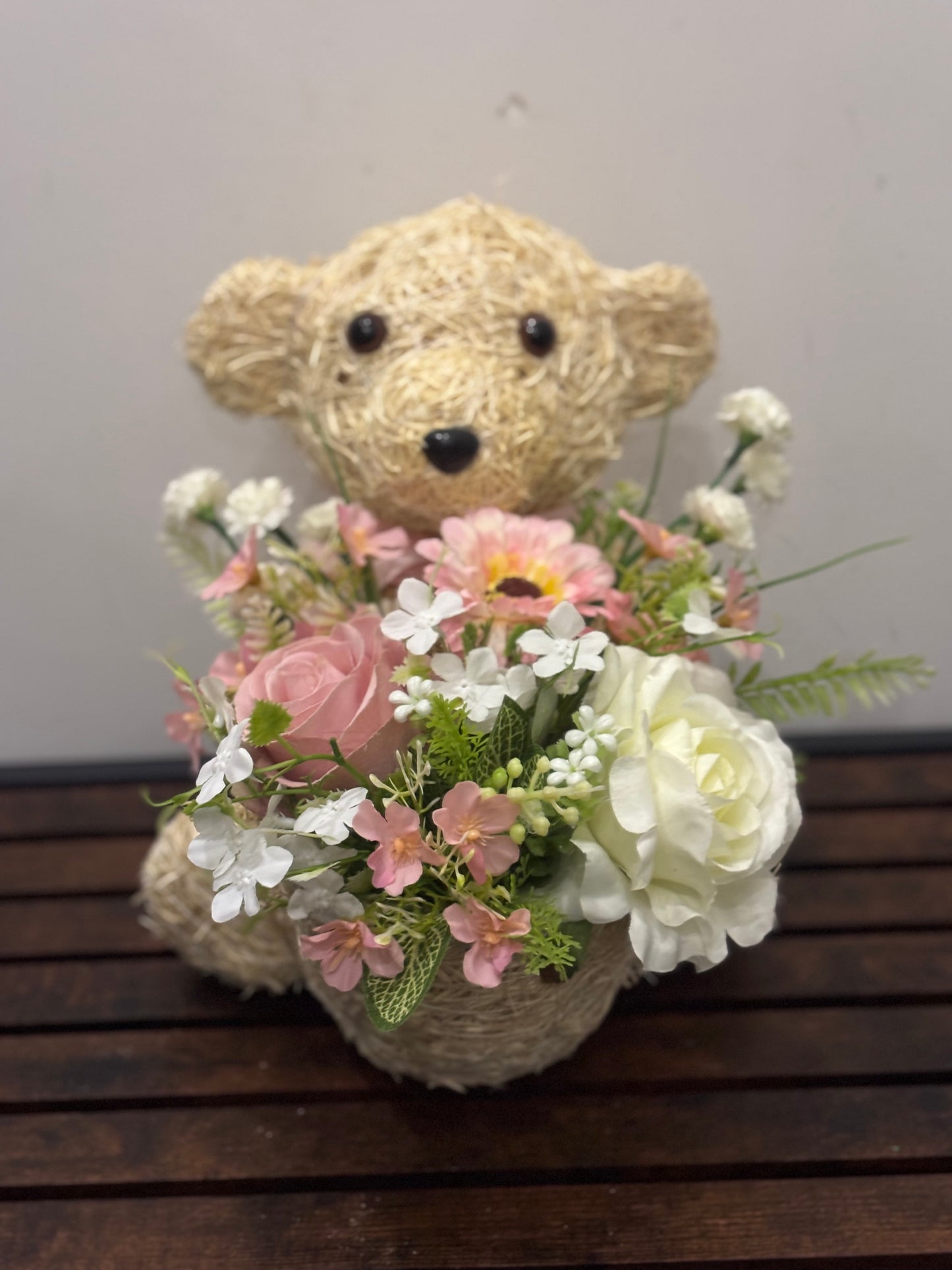Teddy bear planter Inc pink floral arrangement