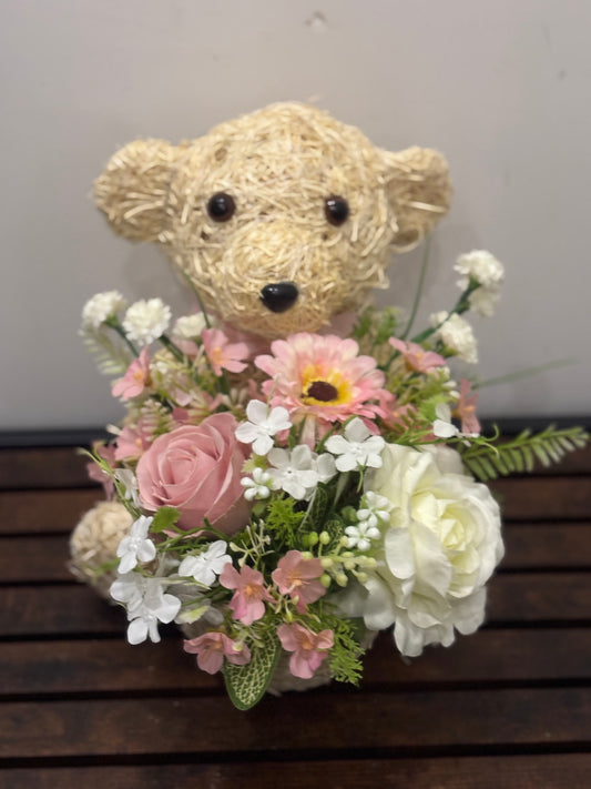 Teddy bear planter Inc pink floral arrangement